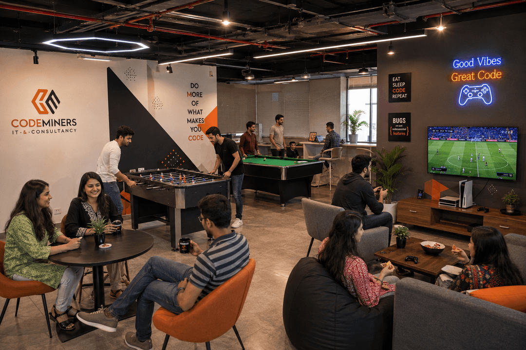 CodeMiners recreation room with pool table, foosball table, PlayStation 5 gaming setup, bean bags and lounge seating — tech company work-life balance facilities